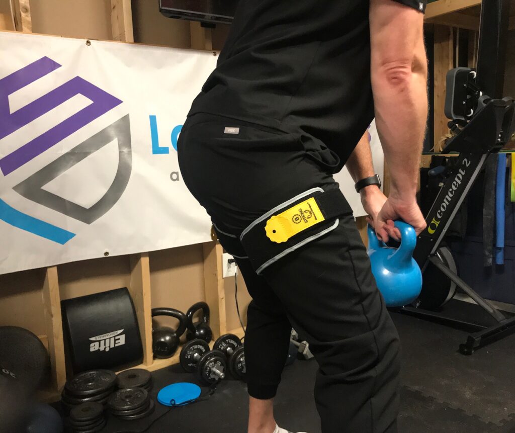 Blood flow restriction training cuff placement. The BFRT band is